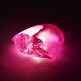 Rough, uncut pink zircon weighing 53.45 carats, a certified loose gemstone.