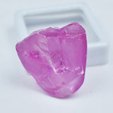 Rough, uncut pink zircon weighing 53.45 carats, a certified loose gemstone.