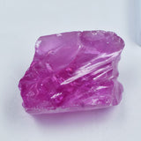 Certified natural pink zircon, a raw and uncut loose gemstone with a weight of 104.00 carats.