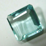 Natural Aquamarine Square Cut Gemstone with Excellent Clarity - Displayed on White Surface