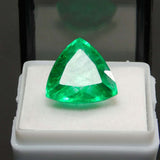 Eye clean emerald in white display case