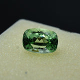 Natural cushion cut bluish-green tourmaline gemstone, 11.55 ct.