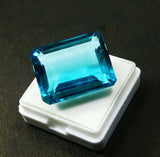 Translucent Emerald Cut Aquamarine Loose Gemstone placed on white box