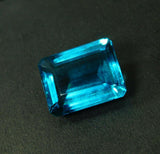 Ocean Blue Aquamarine Gemstone Emerald Shape on black background
