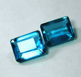 Lab-Created 78 Ct Aquamarine Emerald Cut Gemstone Pair on white background – front view