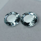 Certified Aquamarine 16.10 Ct Pair with Excellent Cut on Grey Surface - Translucent and Untreated