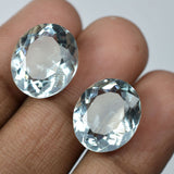 Natural Aquamarine Light Blue Oval Gemstones Shown on Hand - Jewelry Ready Stones