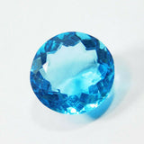Ocean Blue Aquamarine Round Cut Gemstone - Clarity Enhanced and Vintage, on White Surface