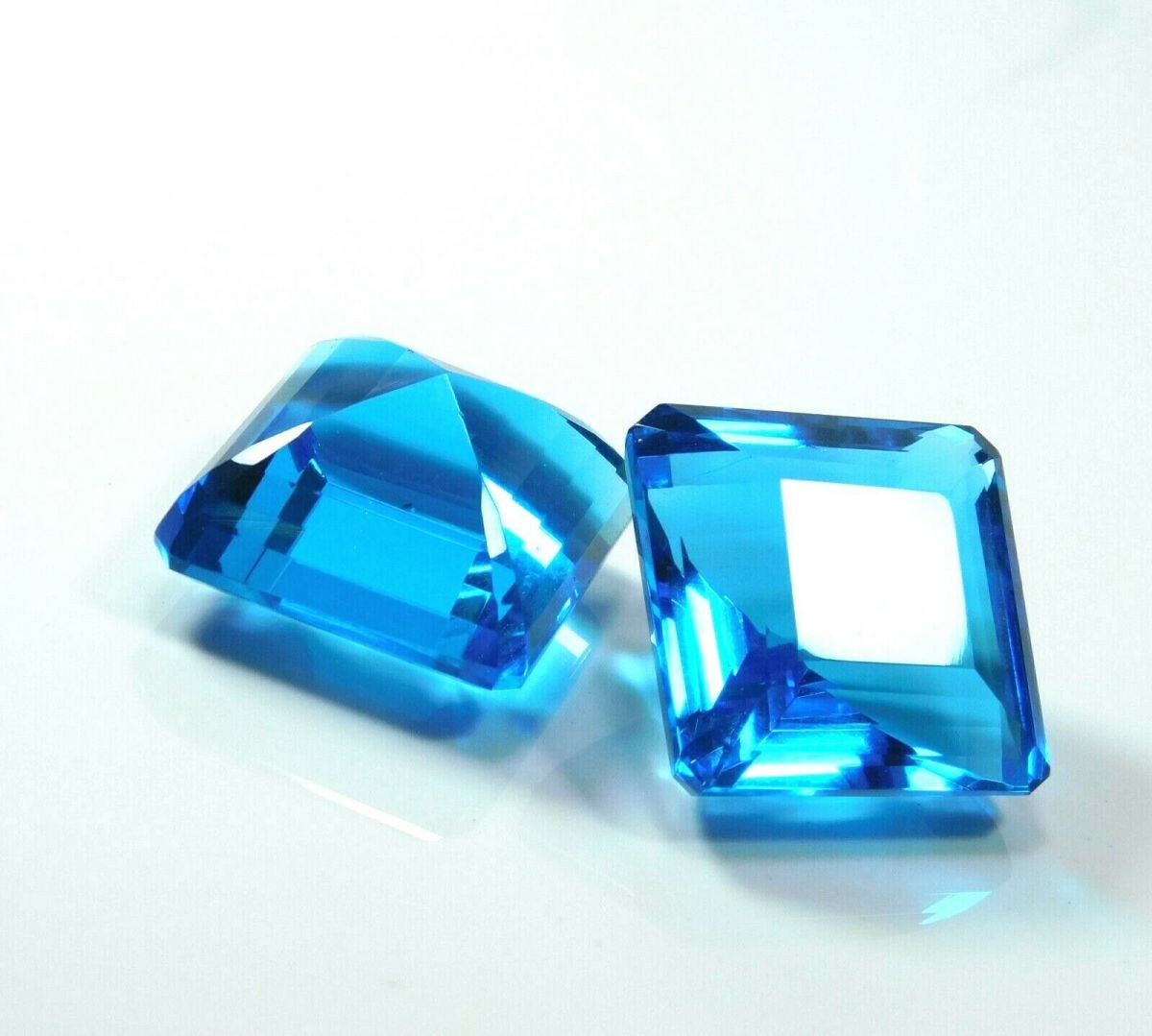 132 Ct Ocean Blue Aquamarine Square Cut Gemstone Pair on White Background - Certified AA++