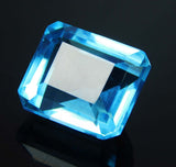 Loose 16 Ct Aquamarine Emerald Cut Gemstone on Black Surface - Natural and GIR Certified