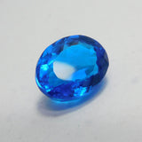 An oval-cut gemstone, a 17.70-carat natural light blue sapphire, which is loose and certified.