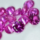 Close-up view of pink ruby round gemstone showing excellent cut and eye-clean clarity – natural 8 mm loose stone