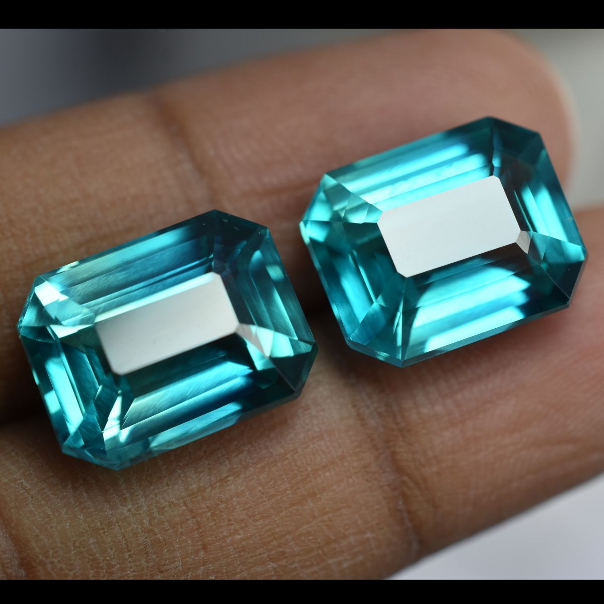 Bluish-green natural sapphire pair, 17.24 carats