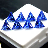Loose trillion cut blue sapphire, 5x5 mm size, 8 ct natural gemstone, certified quality.