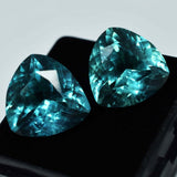 Natural grandidierite pair, trillion cut, 14.95 ct total, bluish-green, certified.