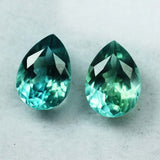 Certified 17 ct natural grandidierite pair, bluish-green pear cut loose gemstones.