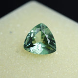 High-quality certified natural grandidierite, bluish-green trillion cut, 3.60 ct.