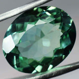 High-quality 11.25 ct oval cut natural Montana sapphire, bluish-green, certified