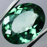 17.25 carat bluish-green oval cut Montana sapphire, certified natural loose stone.