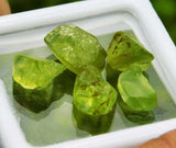 Natural Green Peridot Rough 1000 Carat - side profile with natural inclusions
