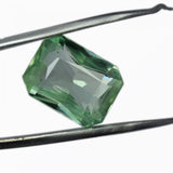 Natural grandidierite gemstone, 9.40 ct bluish-green emerald cut, certified.