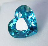 8.56 carat bluish-green heart cut grandidierite, certified natural and rare