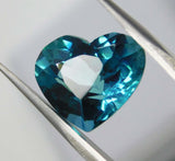 High-quality 8.56 ct heart cut natural grandidierite, rare bluish-green, certified.