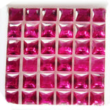 Eye-clean natural square rubies arranged neatly in small gemstone case – rich red certified gemstones