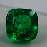 Emerald on a white background from a slightly adjusted front view, emphasizing its smooth surface.