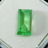 Loose 5.26 ct bluish-green grandidierite, natural baguette cut gemstone, certified quality.