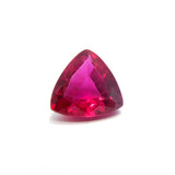 Eye-clean trillion cut red ruby resting on full white surface – 4.75 Ct loose gemstone from Mozambique
