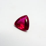 Certified natural ruby 4.75 Ct in brilliant trillion cut captured from alternate angle on white background