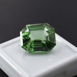Certified natural grandidierite gemstone, emerald shape, bluish-green, 12.32 carats, loose stone