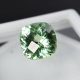 Loose square cushion cut grandidierite, 7.90 ct natural gemstone, bluish-green, certified quality.
