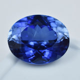 Natural/Lab-Created Blue Tanzanite Oval Cut 15.90 Carat Loose Gemstone on White Background