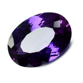 Rare Purple Tanzanite 13.70 Carat Oval Cut Loose Gemstone on White Background – Certified Natural