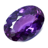 Translucent Purple Tanzanite Oval Gemstone 13.70 Ct Shown on White Background – Certified Natural