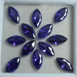 Elegant Flower-Shaped Layout of Purple Tanzanite Marquise Stones in White Box – Certified 10x5mm Lot