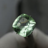 High-quality certified 11.35 carat natural Montana sapphire, bluish-green cushion cut gemstone.