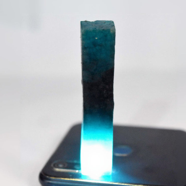 Natural aquamarine blue rough crystal – elongated uncut gemstone.