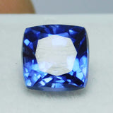 A cushion-cut blue sapphire weighing 10.23 carats, a certified natural loose gemstone.