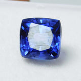 Certified loose gemstone: a natural blue sapphire, 10.23 carats, with a cushion cut.