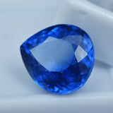 A large, certified, pear-cut natural blue sapphire, weighing 9.00 carats.
