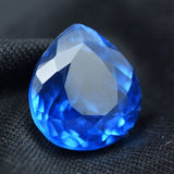 A pear-cut, natural blue sapphire of excellent quality, weighing 9.00 carats.