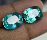 High-quality certified Montana sapphire pair, cushion shape, royal color, total weight 16.56 carats