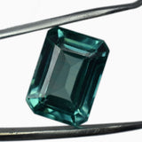 Loose emerald cut Montana sapphire, 8.56 ct, natural bluish-green gemstone, certified quality.