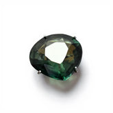 Green gemstone on a white background