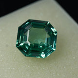 Natural square cut bluish-green sapphire, 13.50 ct, ring size