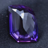 7.70 Ct Natural Purple Tanzanite Fancy Cut Gemstone on Black Background – Certified & Clarity Enhanced