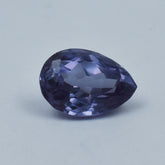 Certified 10.55 Ct Alexandrite pear cut gemstone displayed on white background for jewelry design